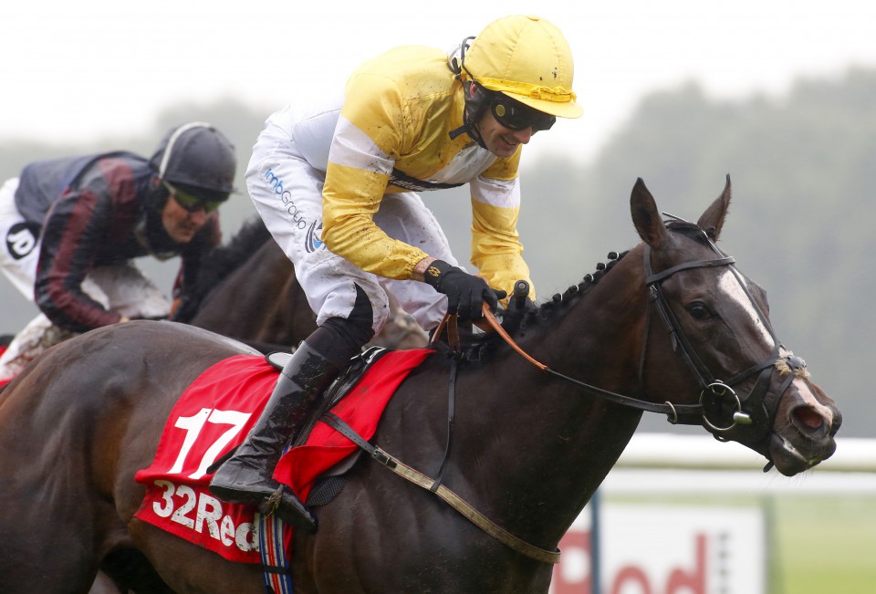 Quiet Reflection and Dougie Costello winning The 32Red Sprint Cup Stakes from The Tin Man