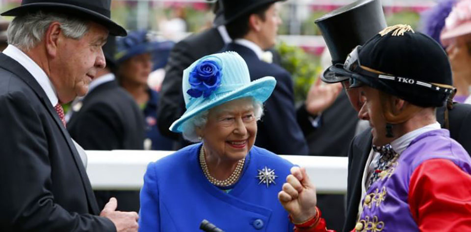 The queen chats to Olivier Peslier